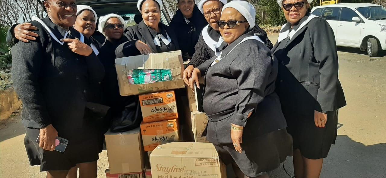 The Western Diocese distributing to those in need — the League’s outreach in action